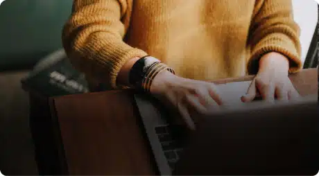 person typing on computer