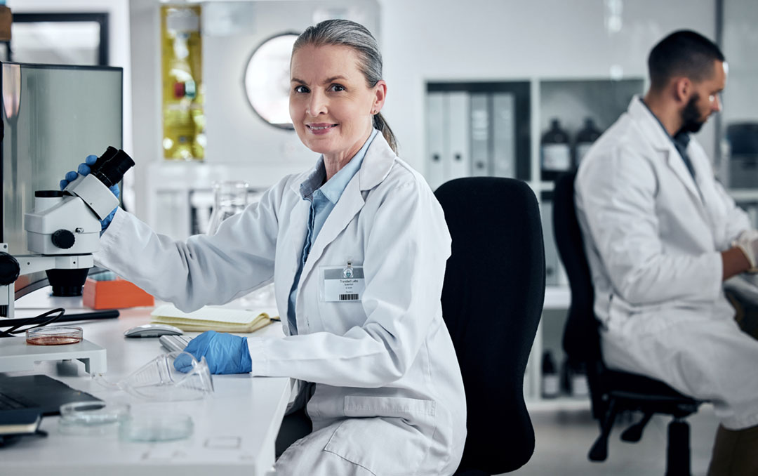 female researcher grey hair in lab