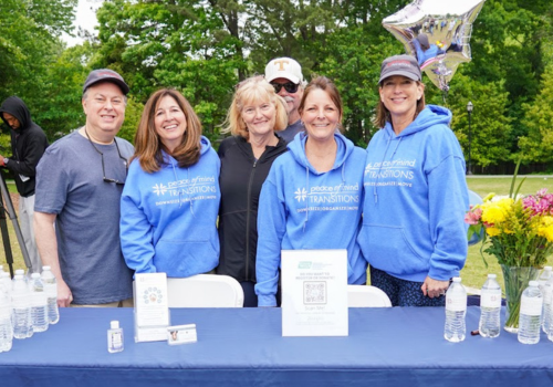 Event Sponsorship.   group of 
Fundraisers at a table