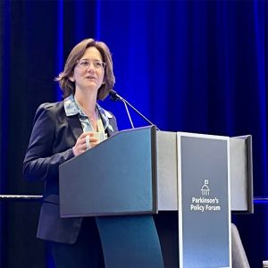 Anne Hubbard, Chief Public Policy Officer at the podium.